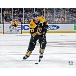Patrice Bergeron Boston Bruins Unsigned Black Jersey Skating Photograph