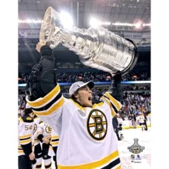 Tuukka Rask Boston Bruins Unsigned 2011 Stanley Cup Champions Raising Cup Photograph